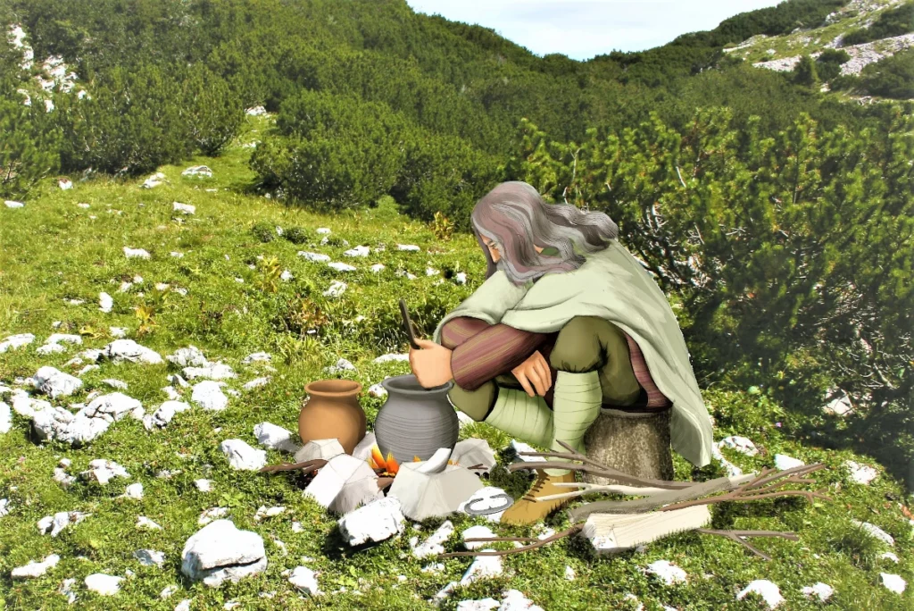 Kuhanje hrane na odprtem ognju v glinenih loncih